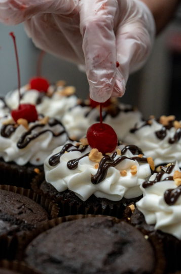 Close-up of a decadent chocolate cupcake with swirled buttercream frosting